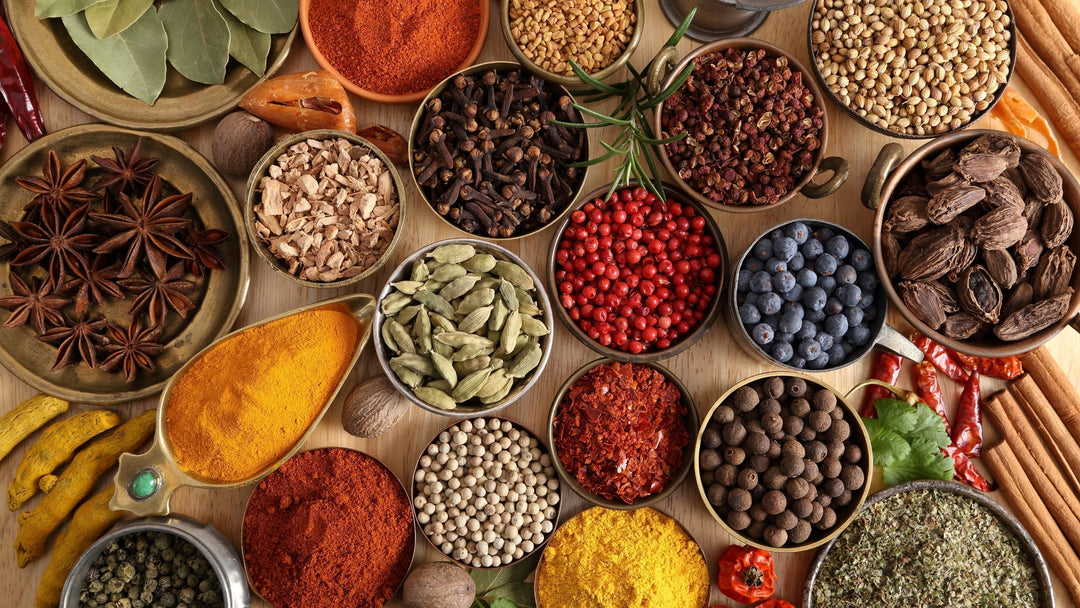 Various Small Bowls of Dried Herbs and Spices