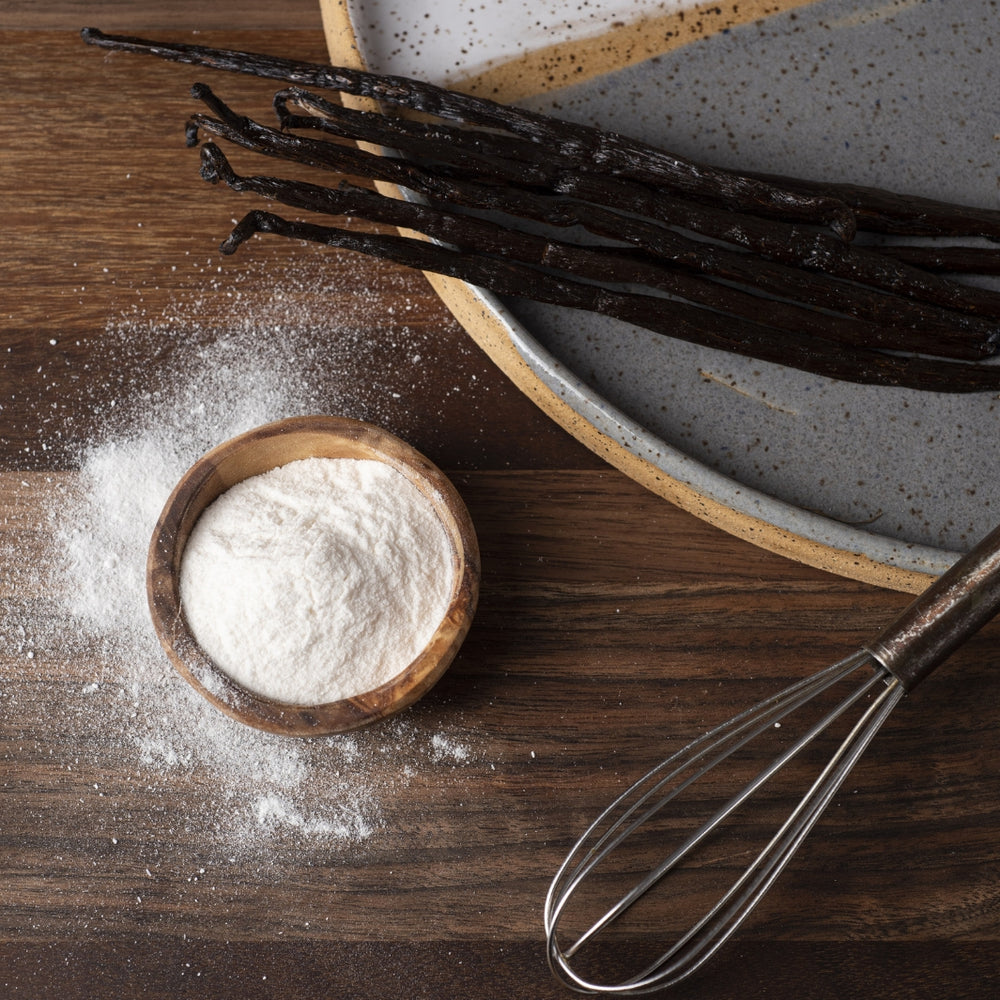 Organic Pure Vanilla Powder and Organic Vanilla Beans in a Baking Scene | Cook's Flavoring Company | Vanilla Beans & Extracts @ Spice Craze®