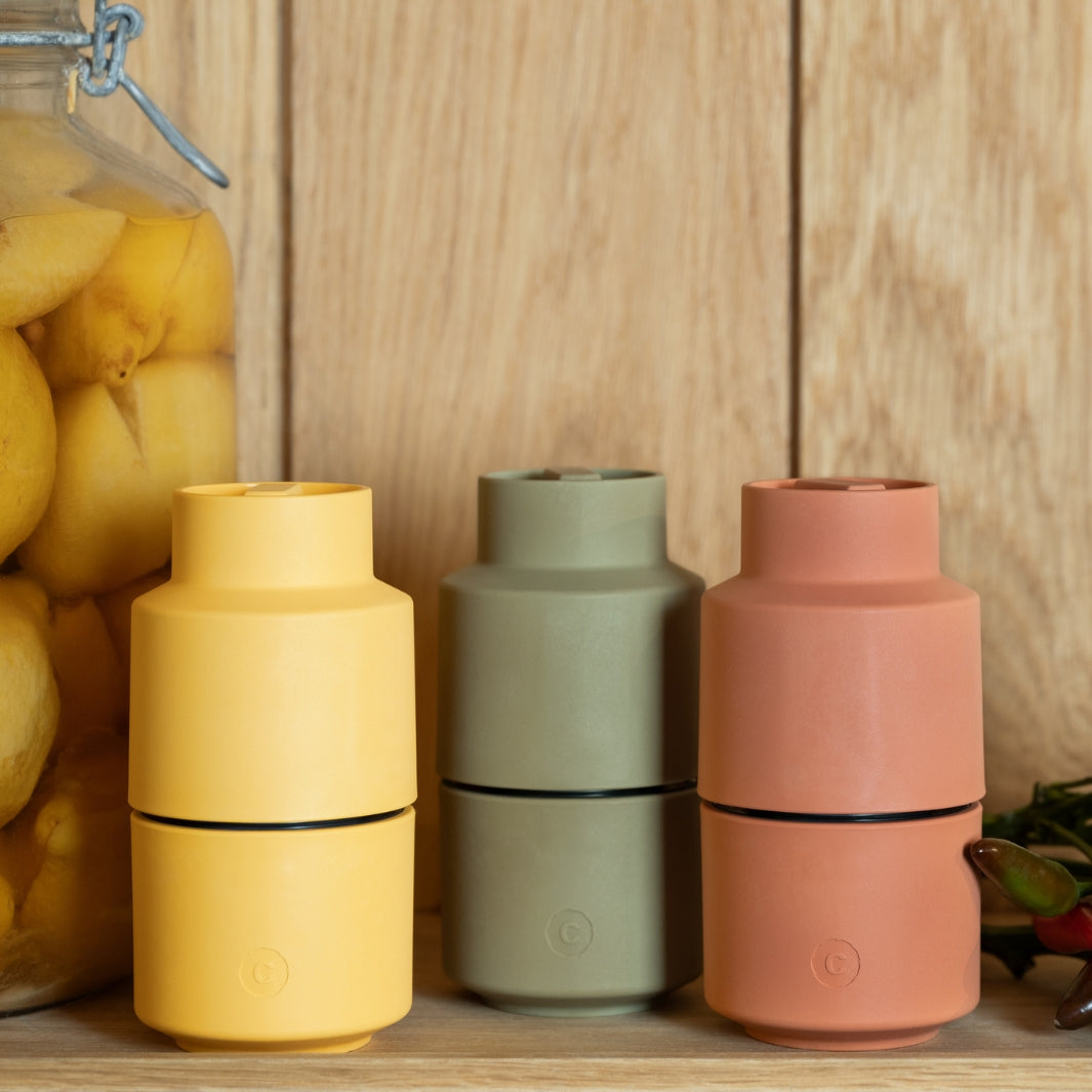 Masala-Colored Billund Grinder and Two Other Billund Grinders with a Jar of Preserved Lemons | CrushGrind® Denmark | Mills & Grinders @ Spice Craze®