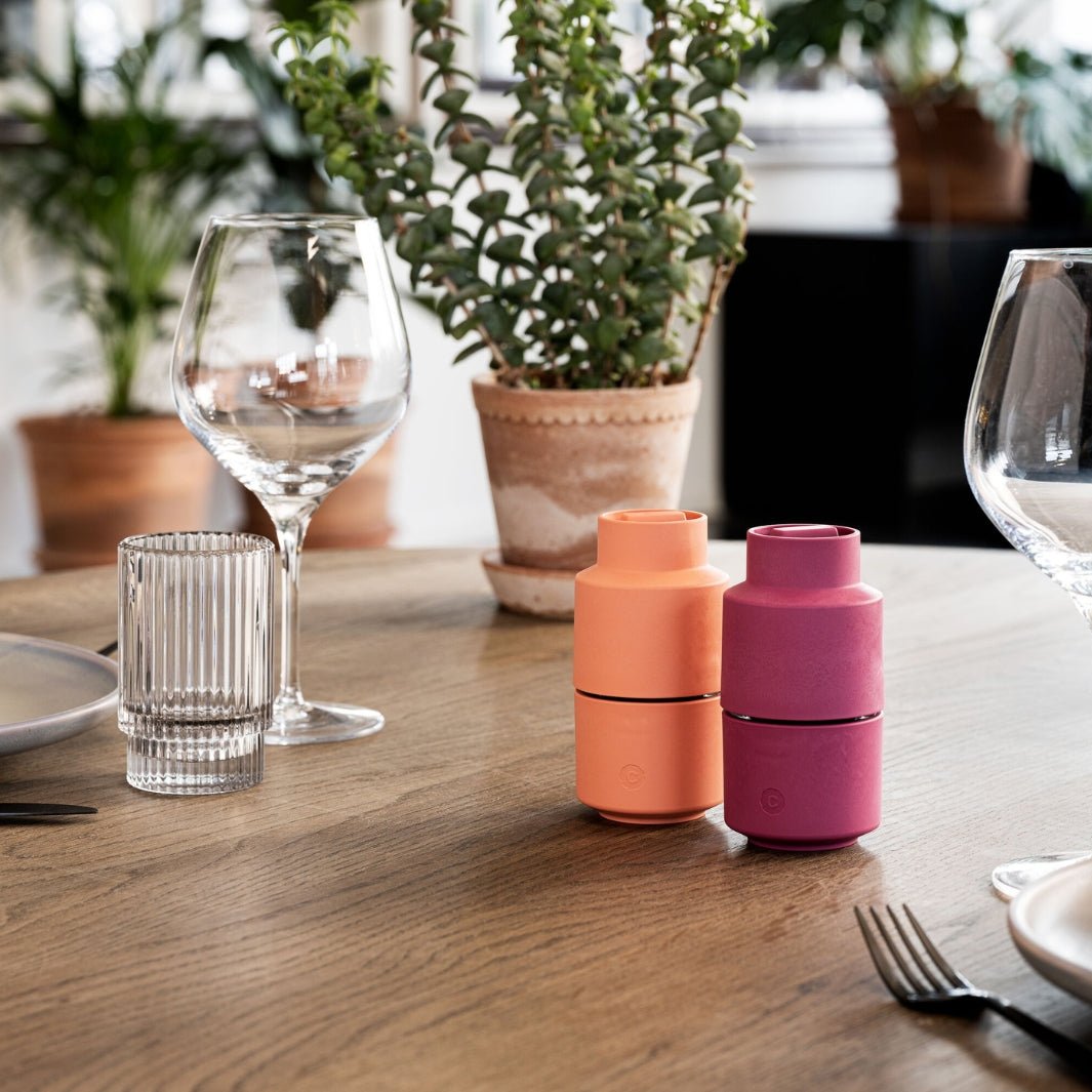 Paprika-Colored and Beetroot-Colored Billund Grinders in a Table Setting | CrushGrind® Denmark | Mills & Grinders @ Spice Craze®