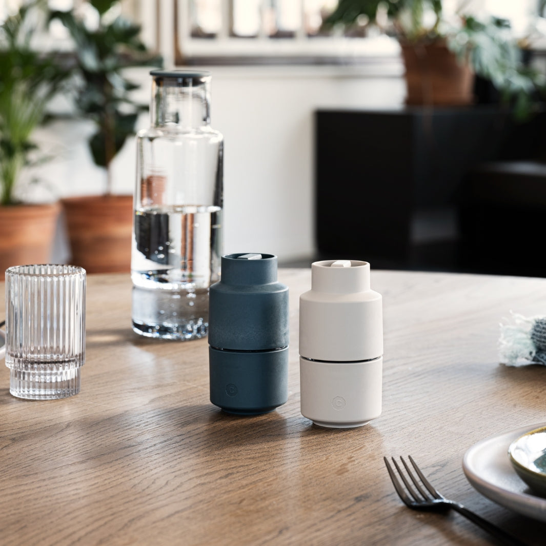 Blueberry-Colored and Cumin-Colored Billund Grinders in a Table Setting | CrushGrind® Denmark | Mills & Grinders @ Spice Craze®