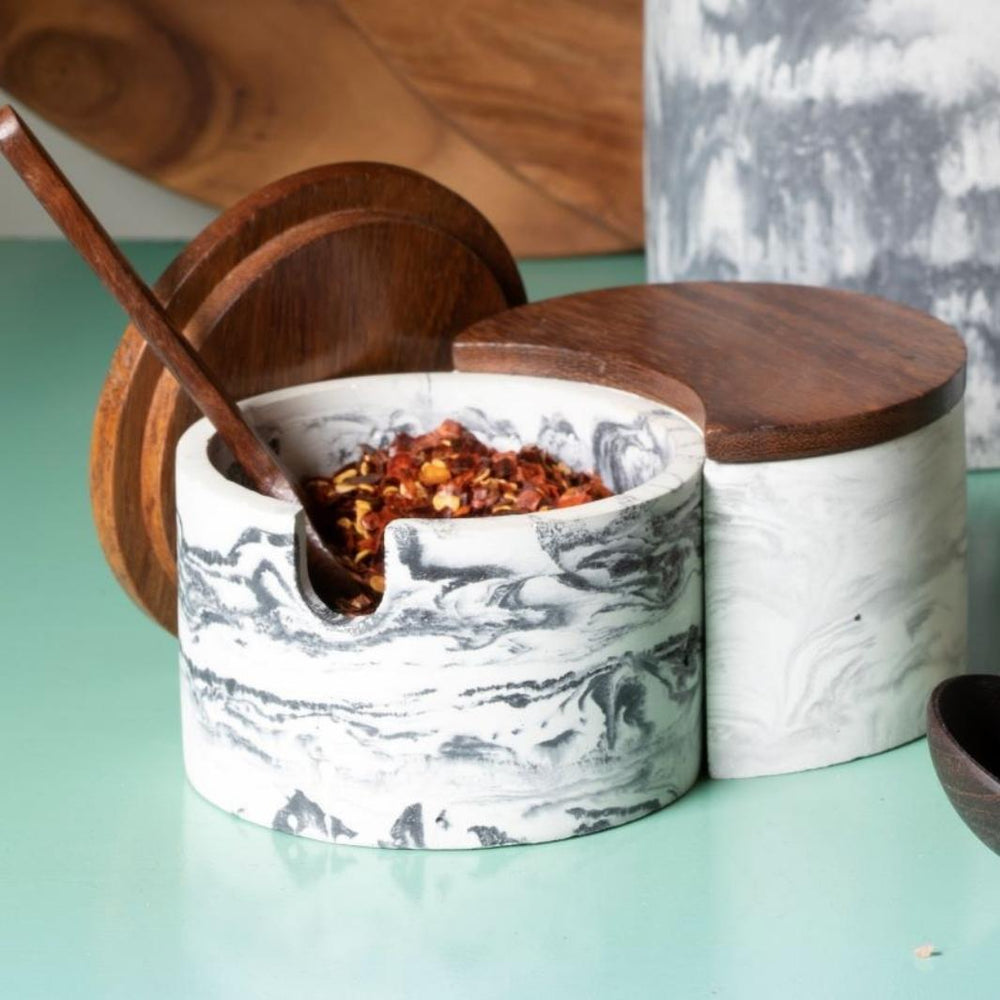 Black/Gray Marbled Cement Interlocking Cellar Set with Wooden Lids and Spoon Scooping Chile Flakes | Be Home US | Keeping It Pretty @ Spice Craze®