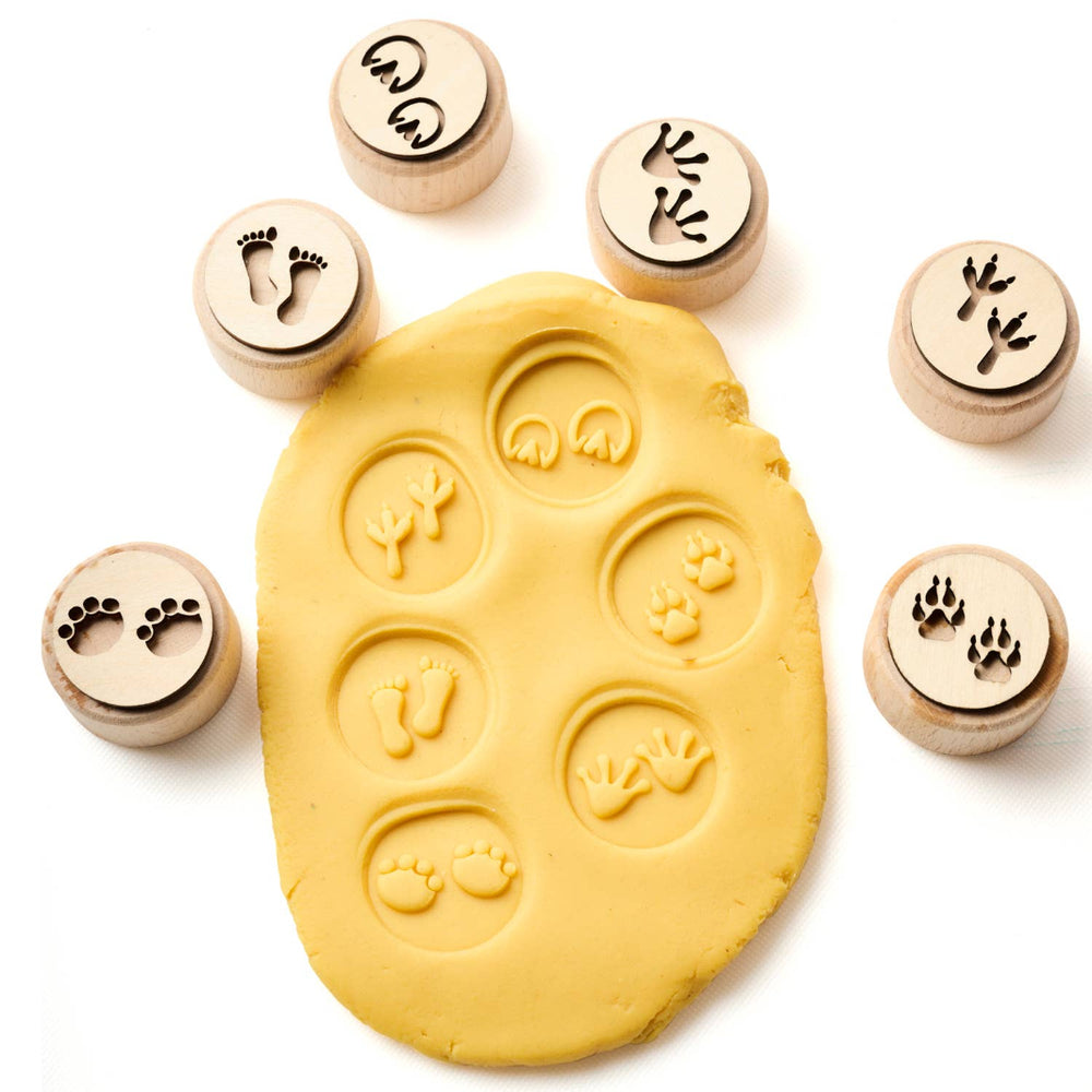 Six Different Wooden Dough Stamps of Animal Tracks in Yellow Dough | Elseware® Unplug | Tiny Tastemakers @ Spice Craze®