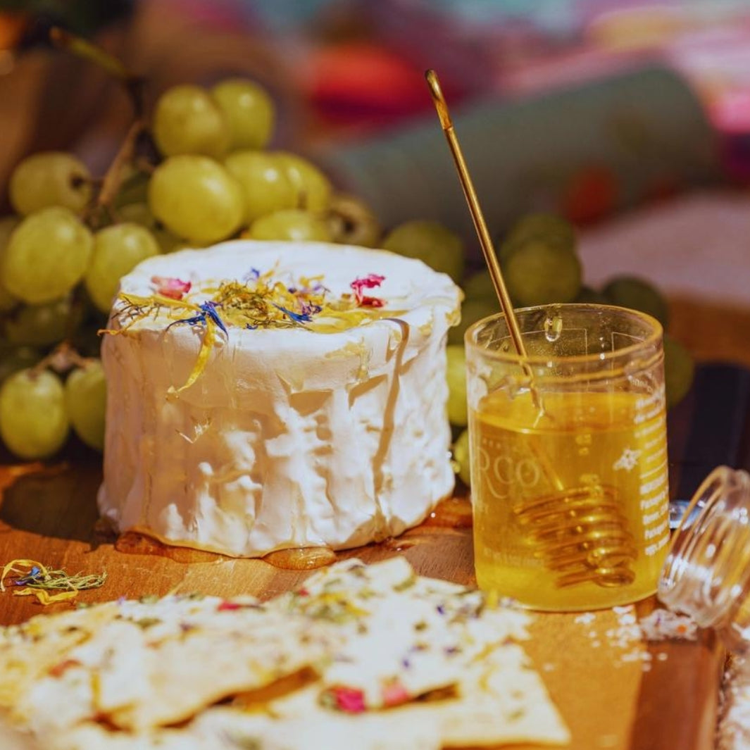 Edible Flower Petals Sprinkled on a Mini Camembert and Drizzled with Honey | Flouwer Co.® | Sips & Twists @ Spice Craze®