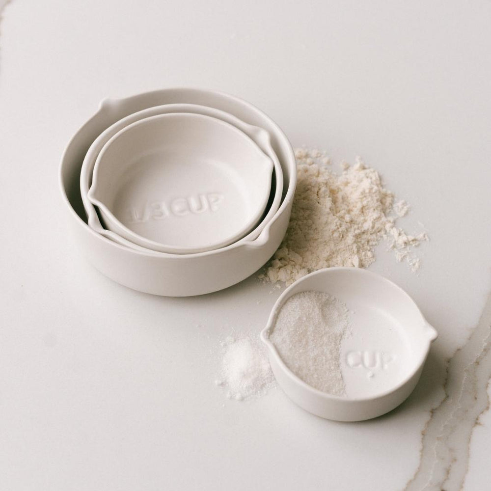 White Brampton Stoneware Measuring Cups in a Baking Scene | Be Home US | Measuring & Mixing @ Spice Craze®