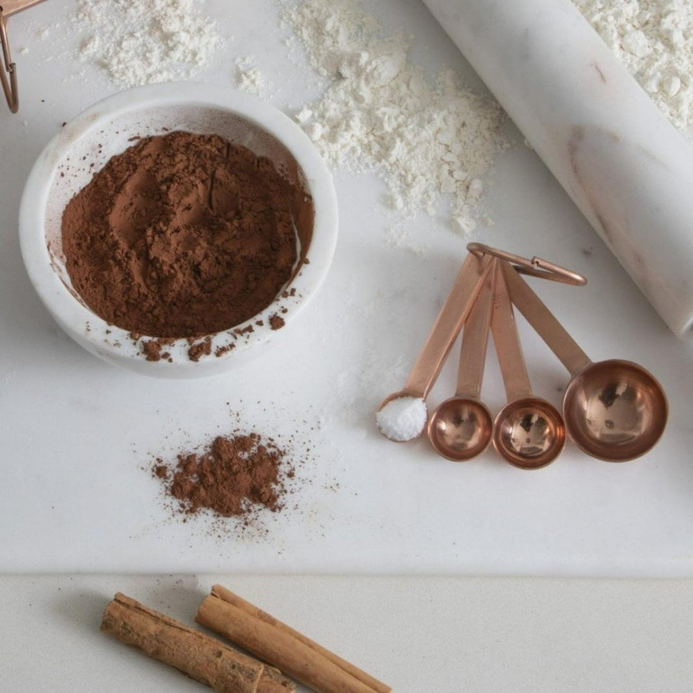 Set of 4 Acadia Copper Measuring Spoons in a Baking Scene | Be Home US | Measuring & Mixing @ Spice Craze®