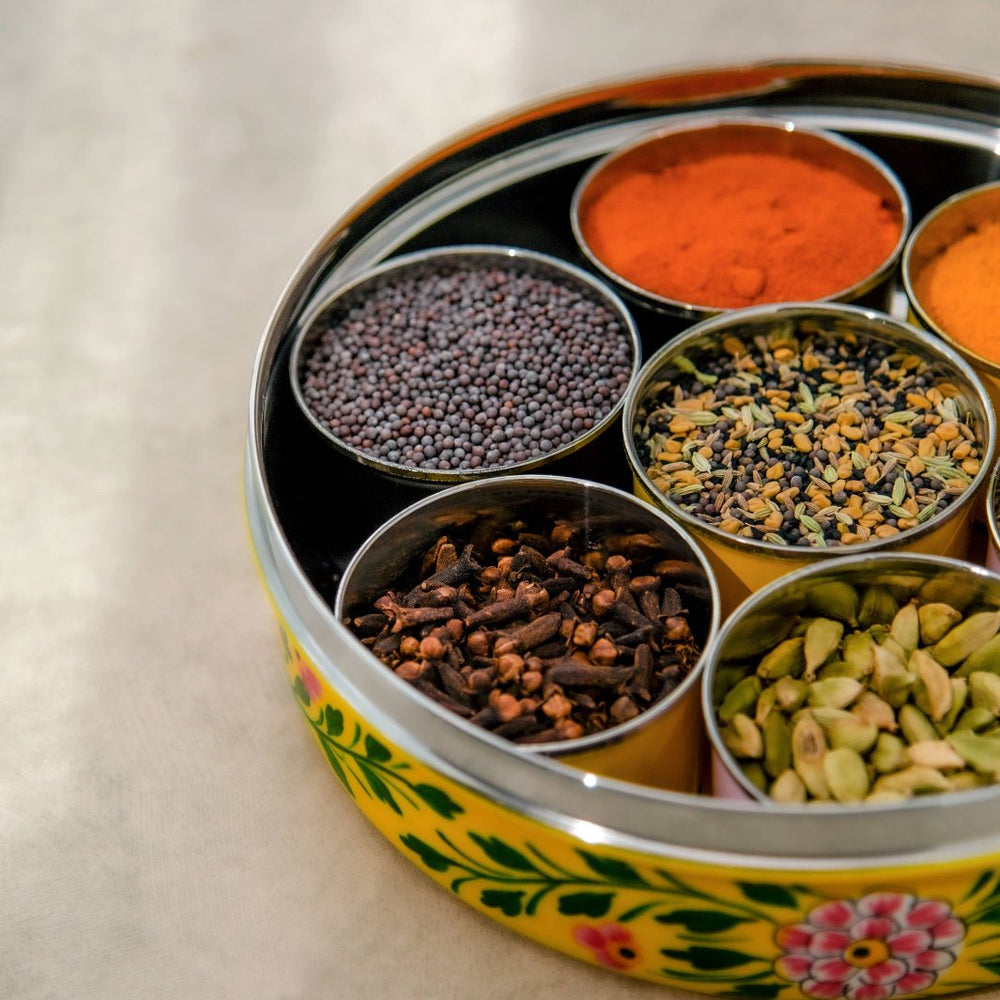 Stainless Steel Bowls with Spices Inside a Yellow Indian Masala Dabba Spice Box | Calcutta Kitchens | Keeping It Pretty @ Spice Craze®