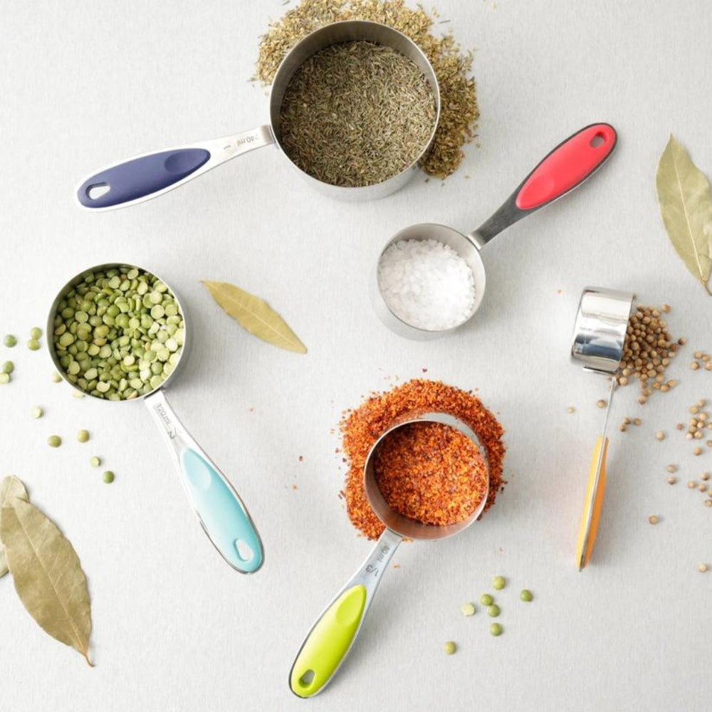 Colored-Handle Measuring Cups on a Concrete Counter with Herbs and Spices | Set of 5 | RSVP International | Measuring & Mixing @ Spice Craze®