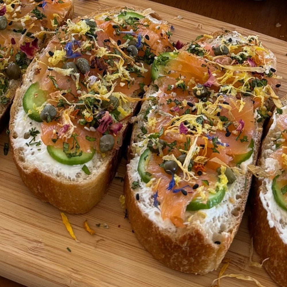 Edible Flower Petals Sprinkled on Smoked Salmon Toasts | Flouwer Co. | Sips & Twists @ Spice Craze®