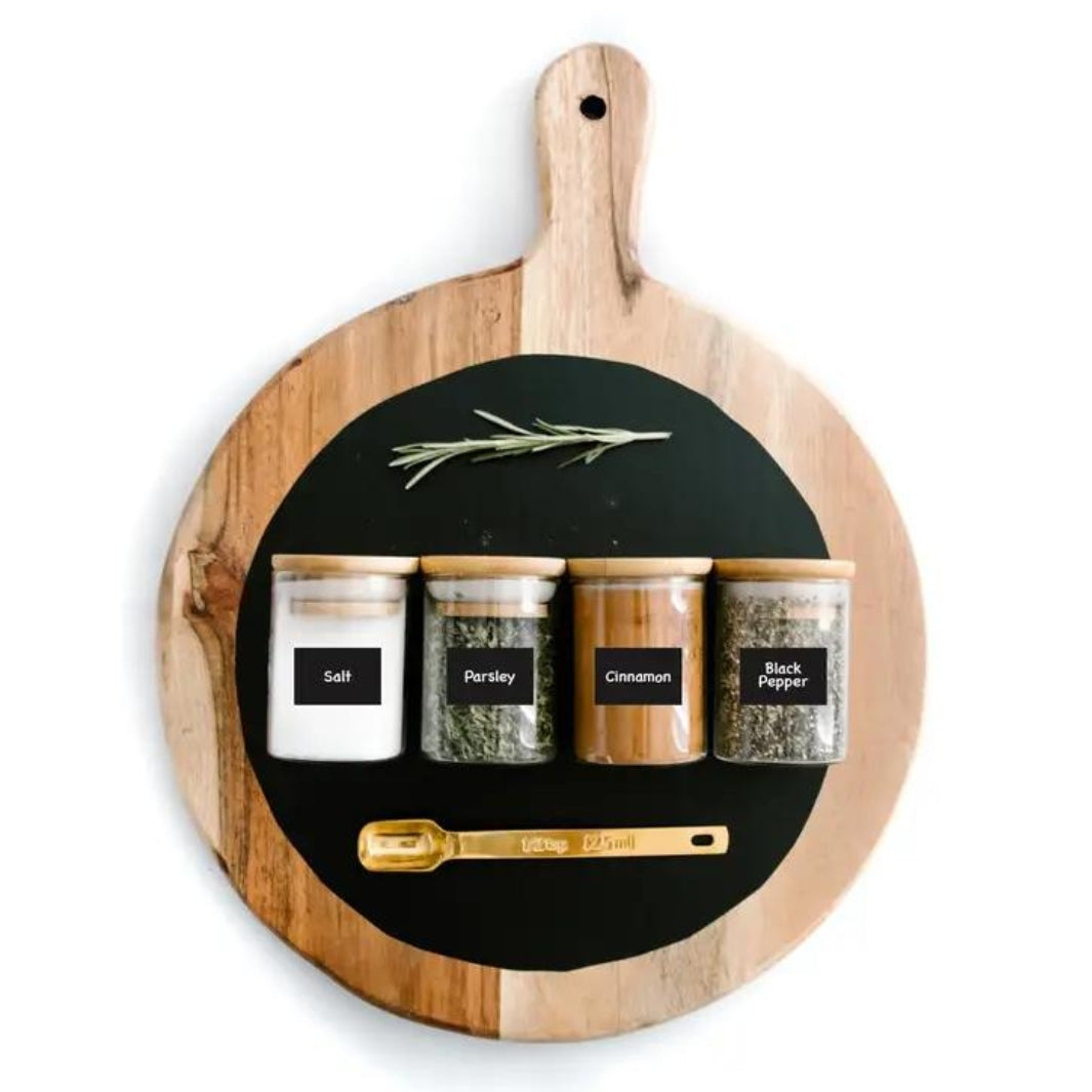 Chalkboard Labels Set Shown on Four Spice Jars on a Round Wooden Board | Savvy & Sorted® @ Spice Craze®