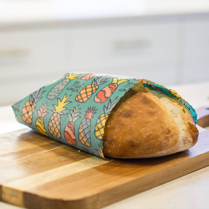Pineapple Print Beeswax Wrap Covering a Loaf of Homemade Bread | Meli Wraps® | Keeping It Pretty @ Spice Craze®