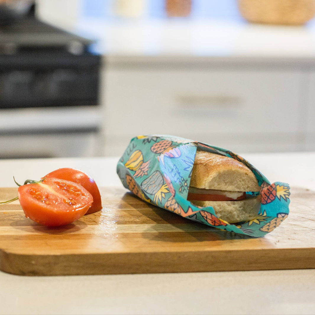 Pineapple Print Beeswax Wrap Covering a Sandwich | Meli Wraps® | Keeping It Pretty @ Spice Craze®