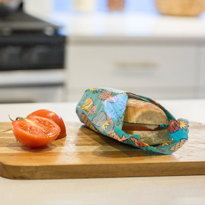 Pineapple Print Beeswax Wrap Covering a Sandwich | Meli Wraps® | Keeping It Pretty @ Spice Craze®