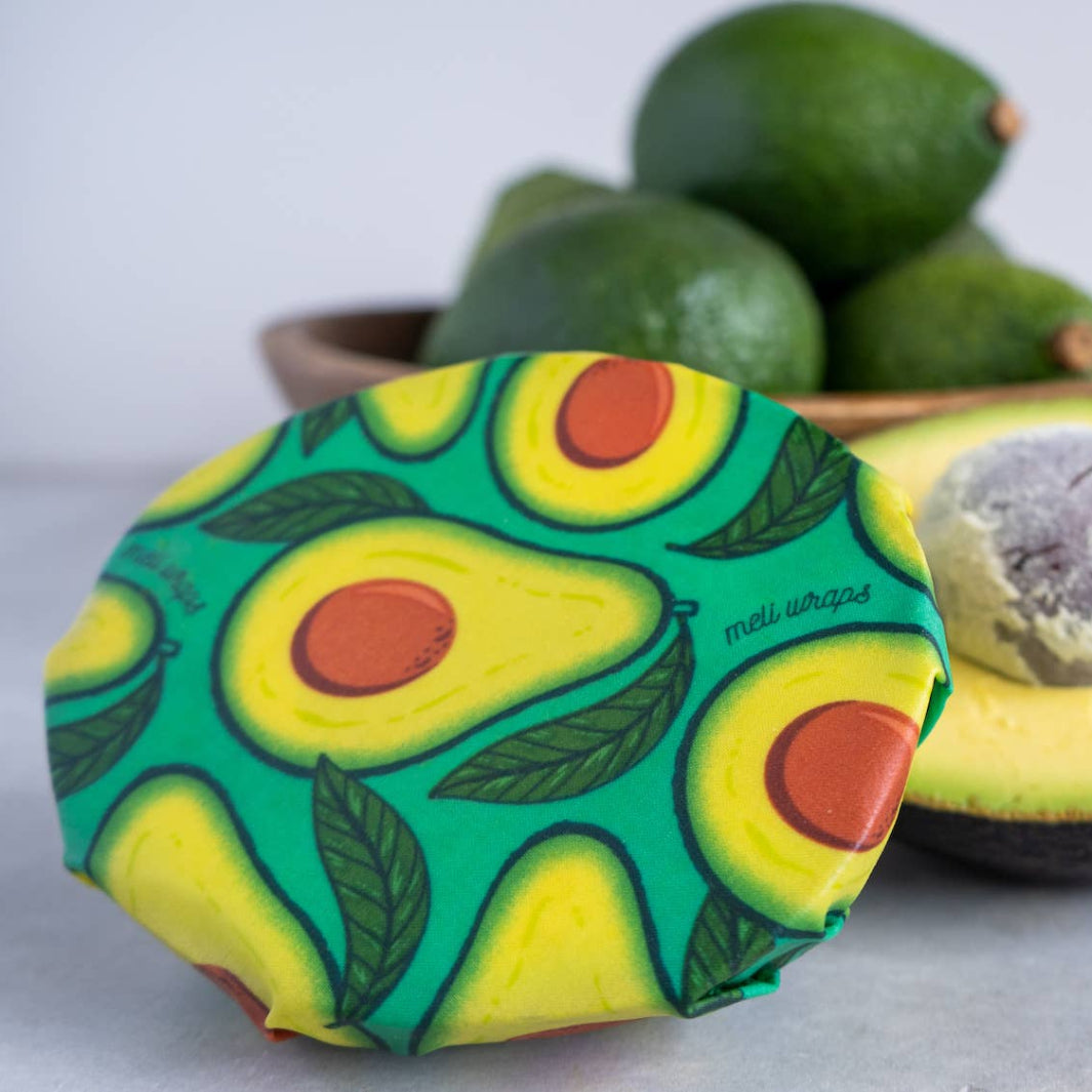 Small Avocado Print Beeswax Wrap Covering Half an Avocado | Meli Wraps® | Keeping It Pretty @ Spice Craze®