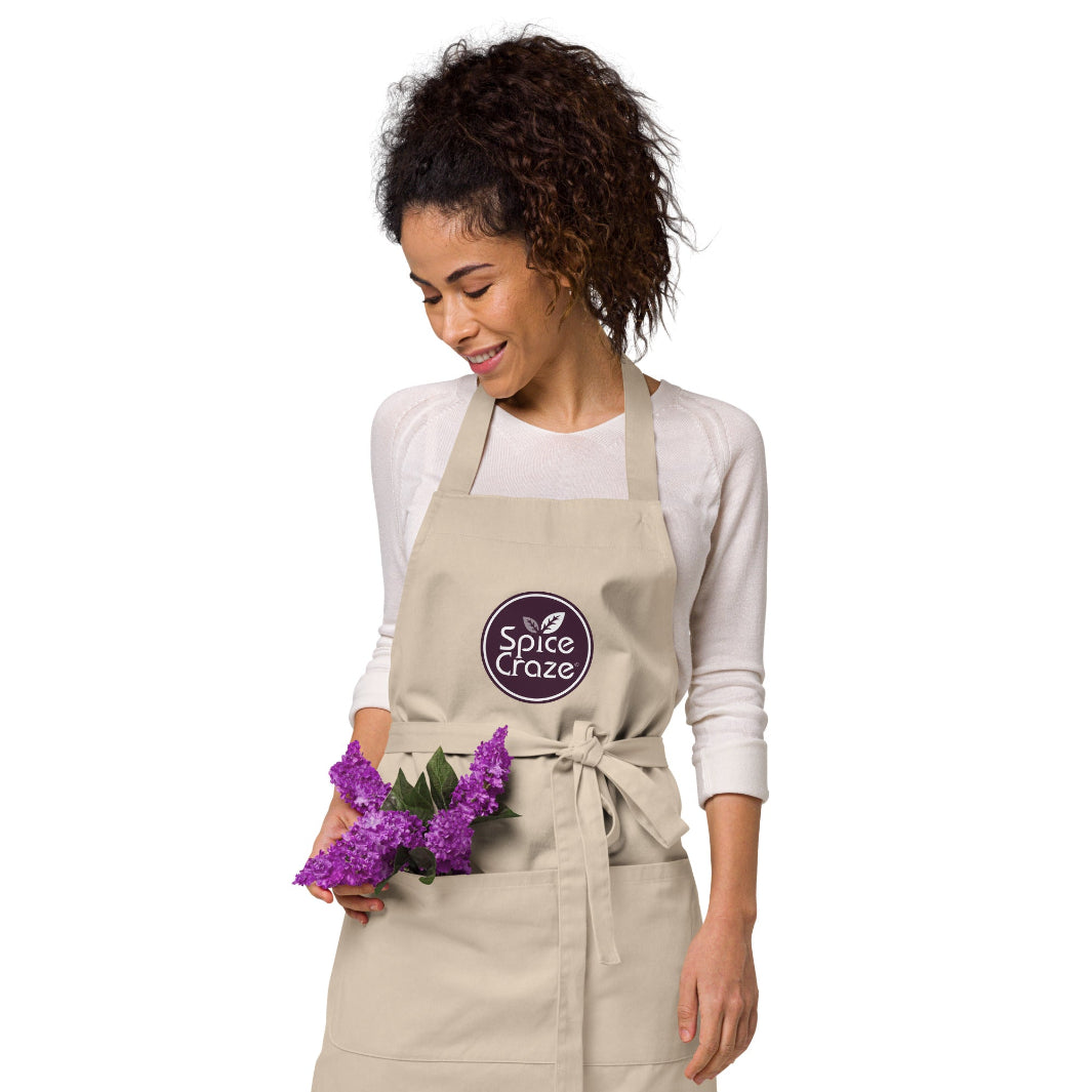 Eggplant-Colored Logo Organic Cotton Apron with Flowers in the Pocket | Spice Craze® Merch @ Spice Craze®