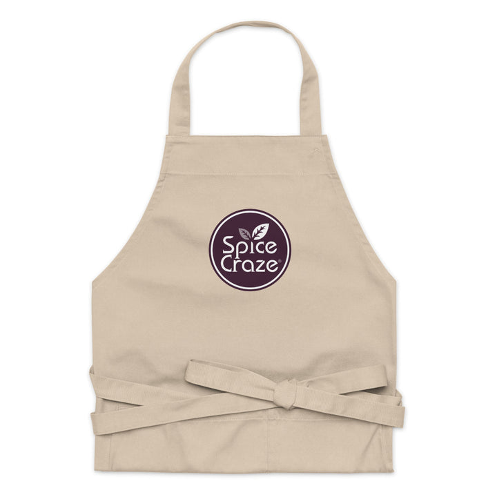 Folded Eggplant-Colored Logo Organic Cotton Apron | Spice Craze® Merch @ Spice Craze®
