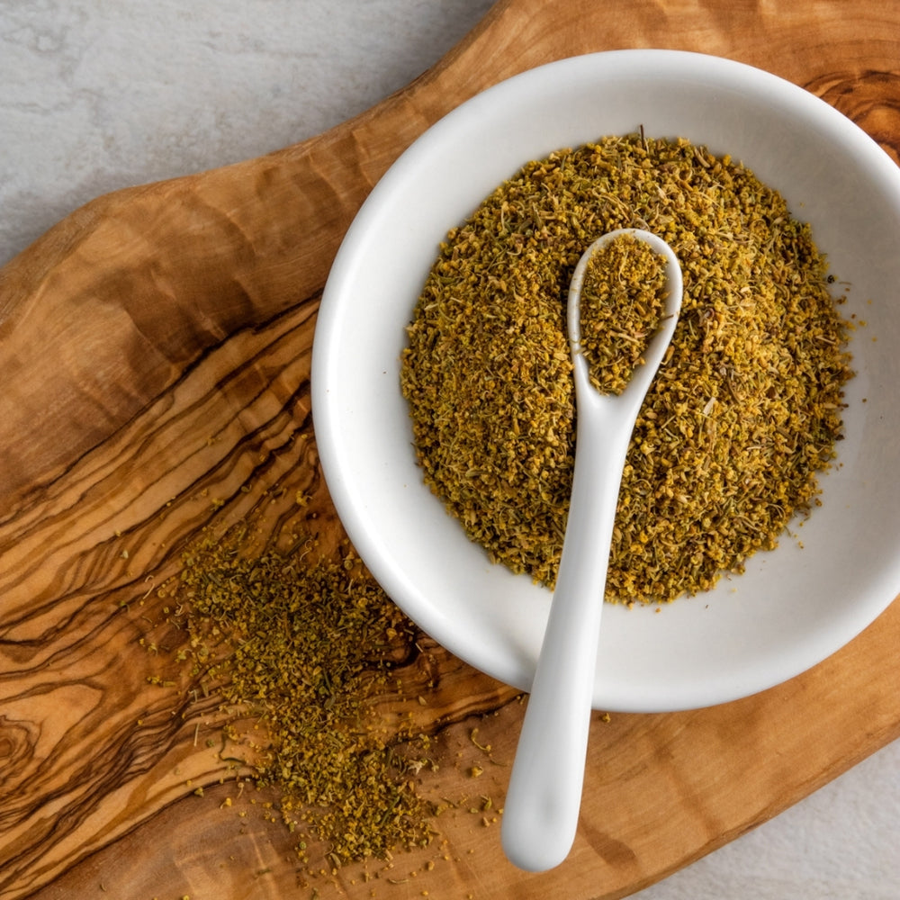 Organic Wild Foraged Fennel Pollen in a Bowl Sitting on a Wooden Plank | Bona Furtuna | Awesome Extras @ Spice Craze®