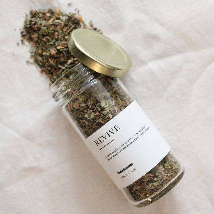 Revive - Organic Loose Leaf Tea Spilling Out of Its Reusable Jar | Nuda Botanica | Matcha, Chai, & Teas @ Spice Craze®