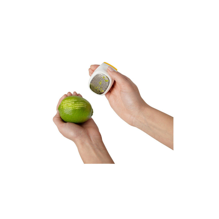 Grating a Lime with the PalmZester™ Citrus Zester | Chef'n® | Grate, Strip, & Zest @ Spice Craze®