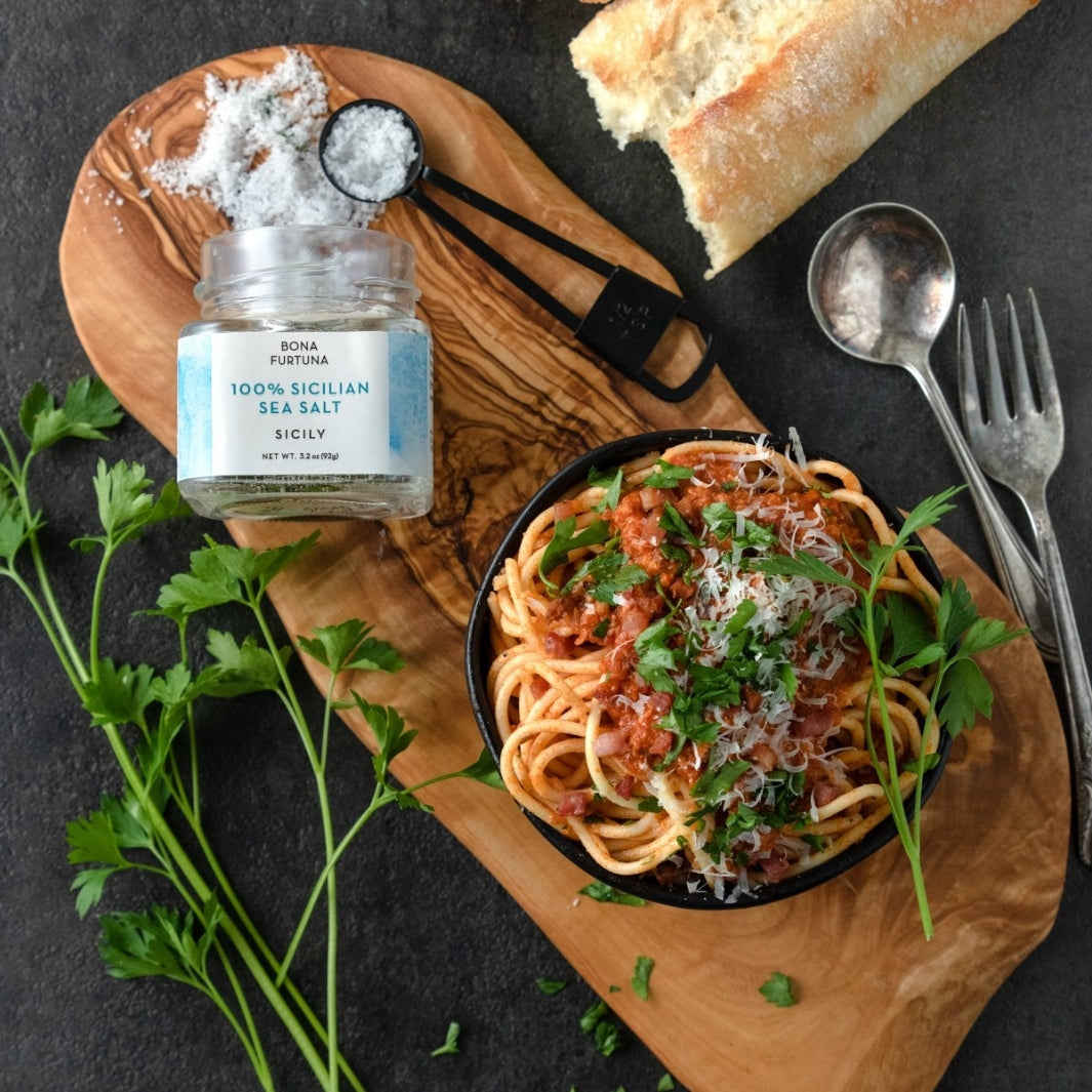 100% Sicilian Sea Salt with a Bowl of Spaghetti, Fresh Parsley, and a Baguette | Bona Furtuna | Specialty Salts @ Spice Craze®